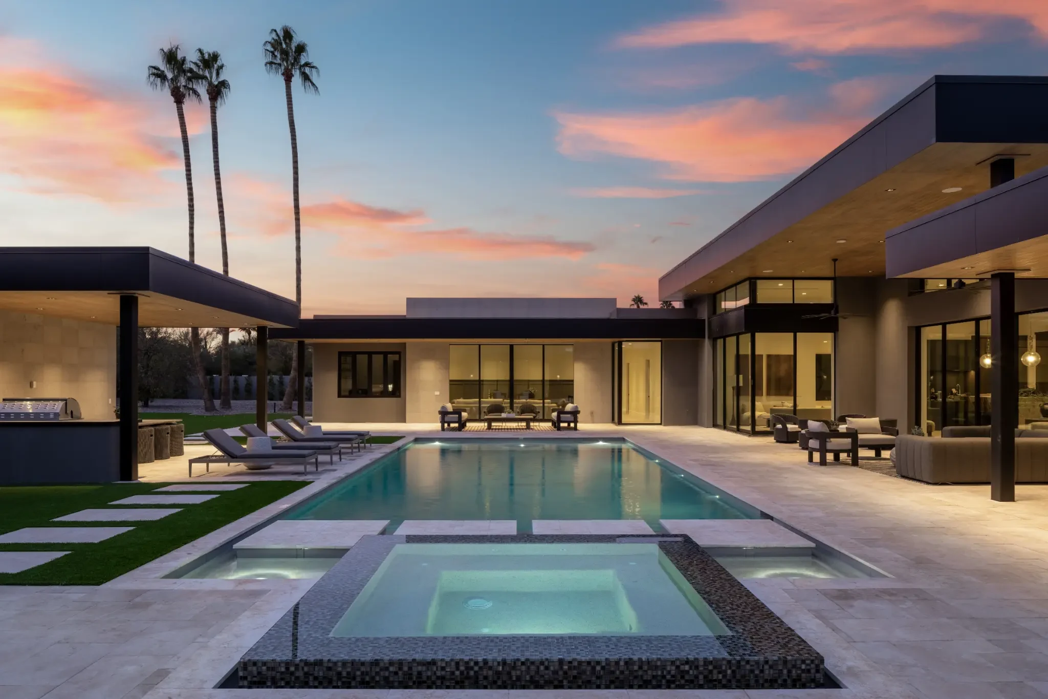 North 64 Estate pool courtyard at dusk in Paradise Valley
