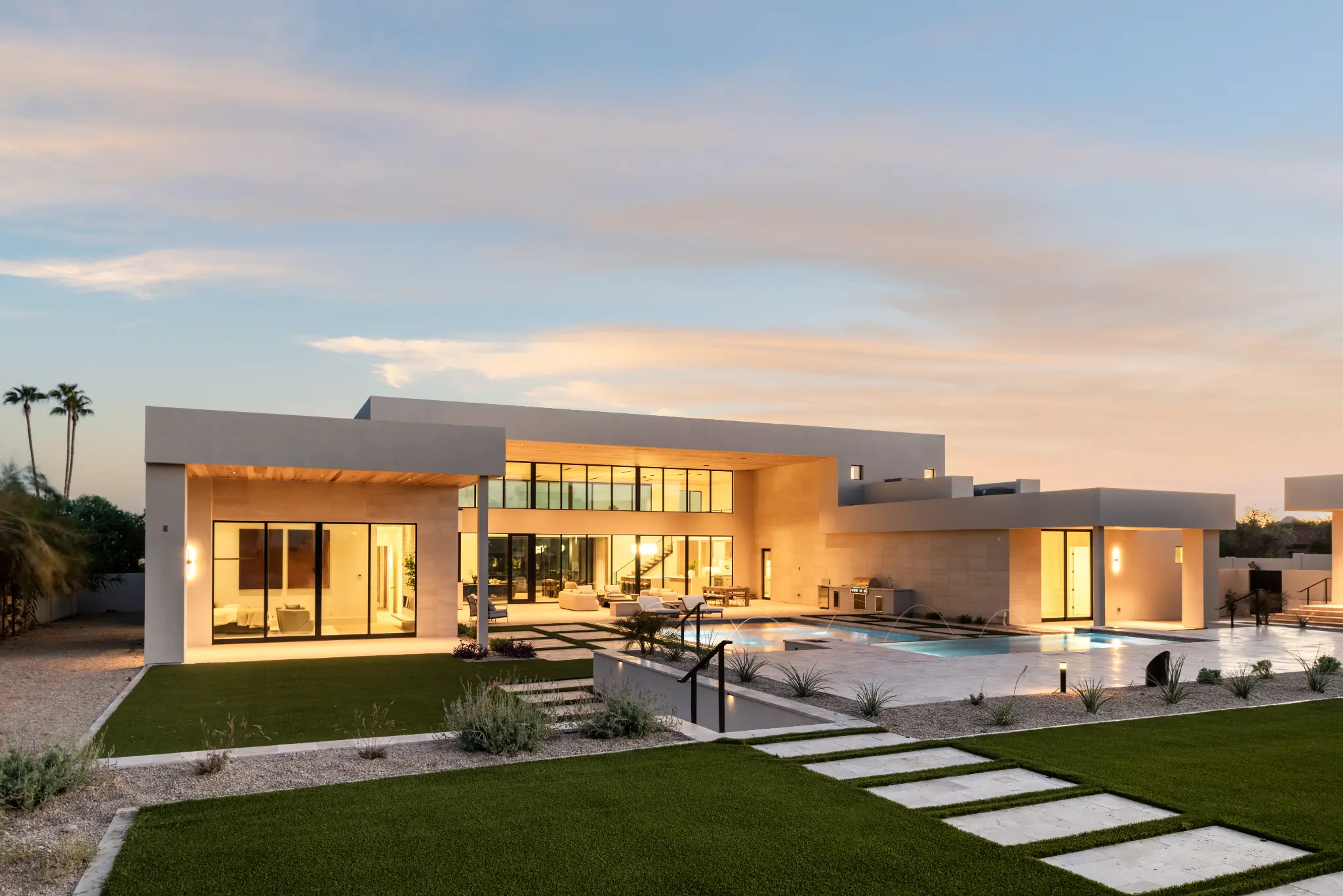 Wethersfield Estate backyard pool at dusk in Scottsdale