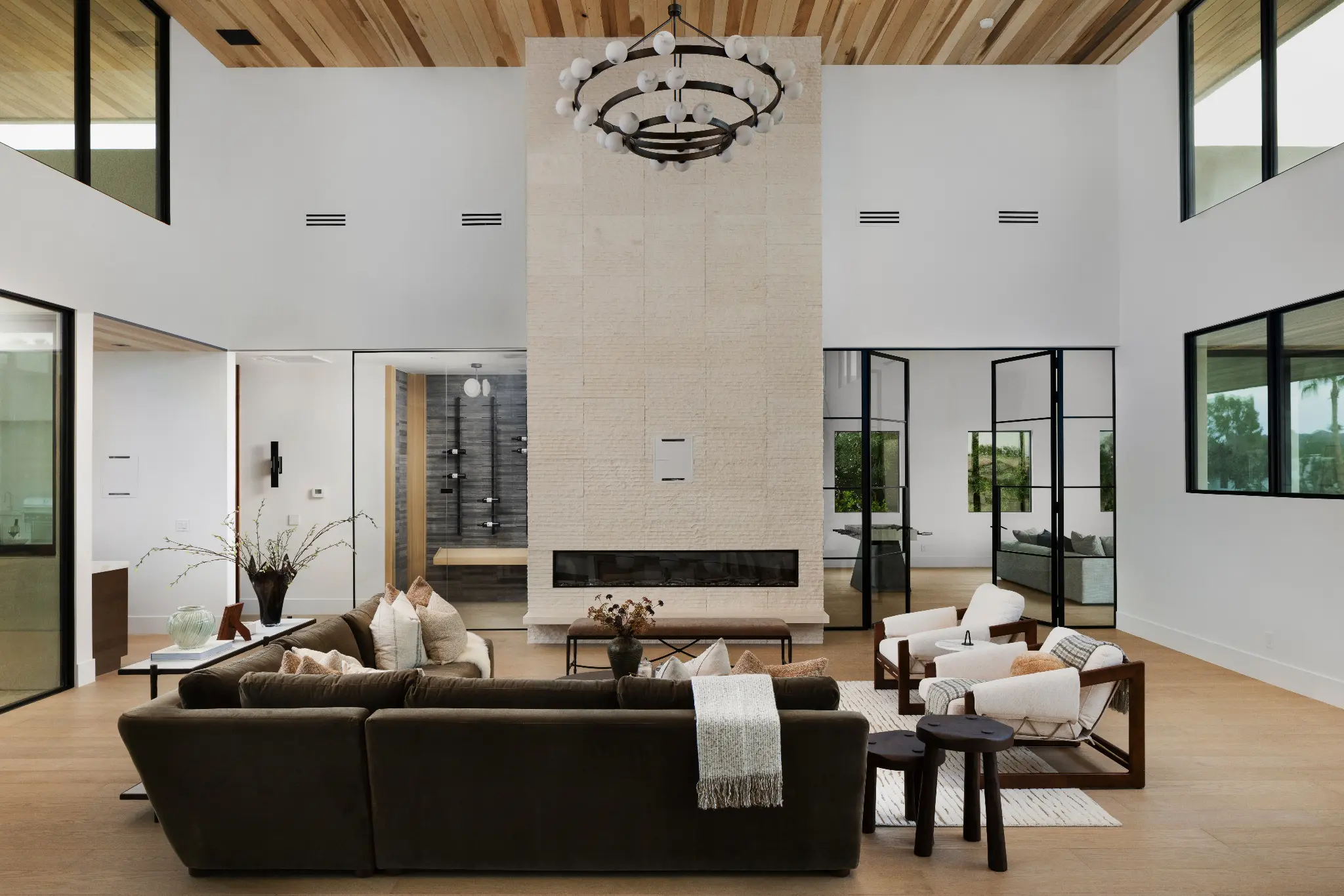 Living room with fireplace and high ceilings at Wethersfield Estate